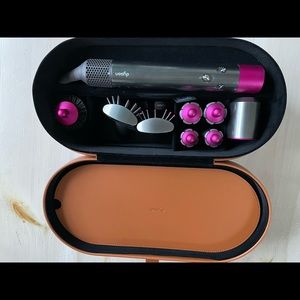 Dyson Airwrap complete with travel case.